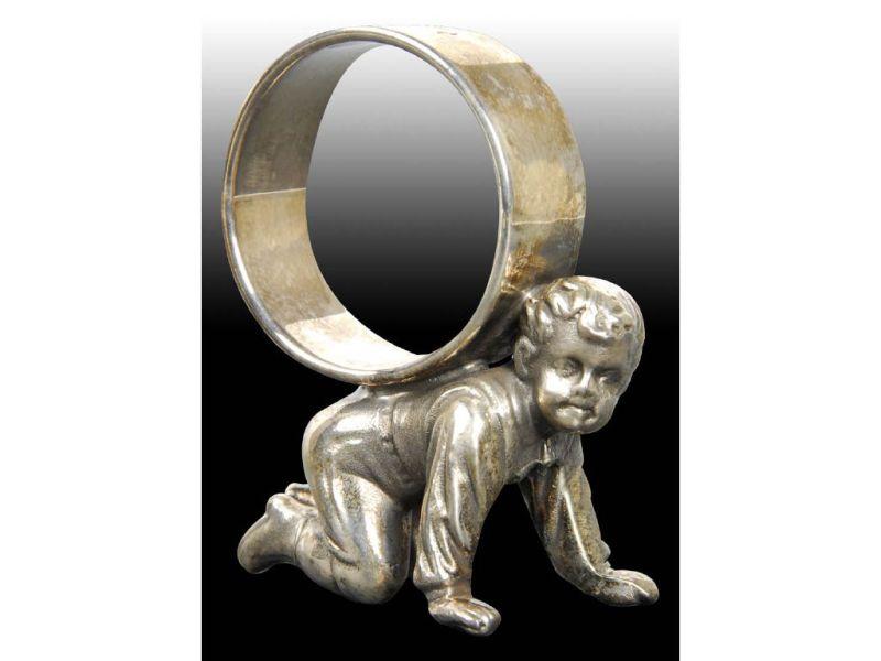 Appraisal: Crawling Boy Balancing Figural Napkin Ring On Back Description No