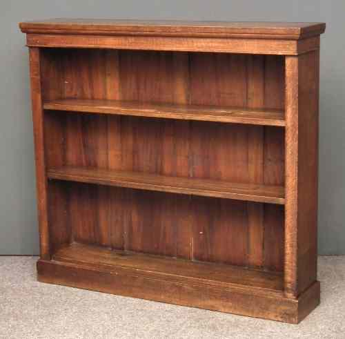 Appraisal: A Victorian oak open front bookcase fitted two shelves ins