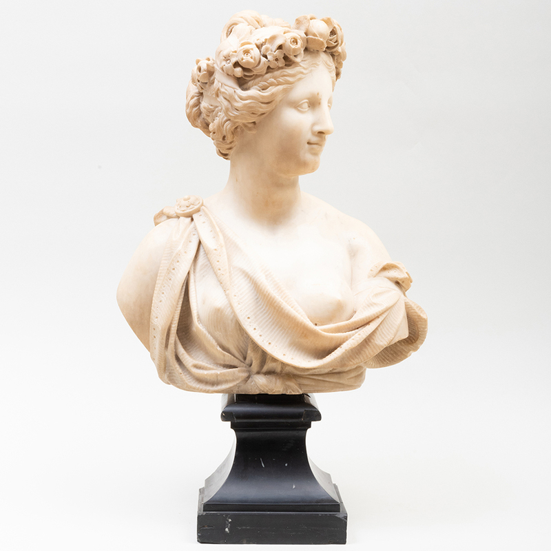 Appraisal: CONTINENTAL CARVED MARBLE BUST EMBLEMATIC OF SPRING Raised on a