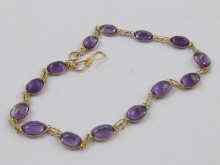 Appraisal: A yellow metal tests ct gold amethyst set bracelet approx