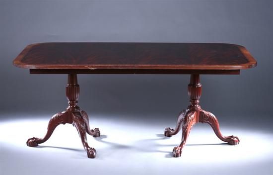 Appraisal: GEORGIAN STYLE MAHOGANY BANQUET TABLE th century with six leaves