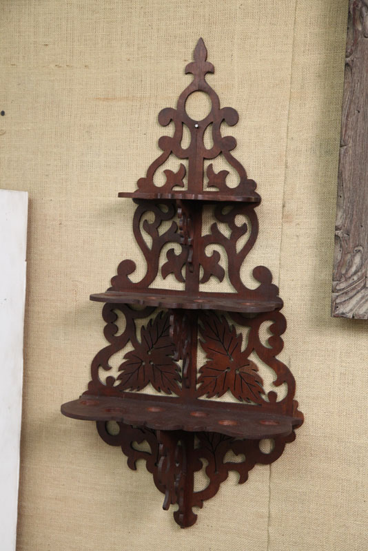 Appraisal: HANGING WHAT-NOT-SHELF Walnut three tier shelf with openwork foliate and