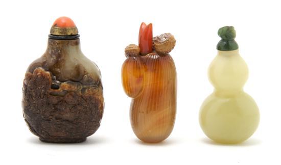 Appraisal: Group of Three Carved Stone Snuff Bottles the first of