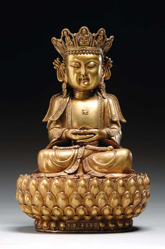 Appraisal: MING-STYLE GILT BRONZE BUDDHA Chinese Ming-style gilt bronze Buddha seated