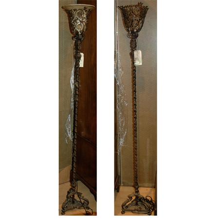 Appraisal: Pair of Neoclassical Style Gilt Decorated Iron Torcheres Estimate -