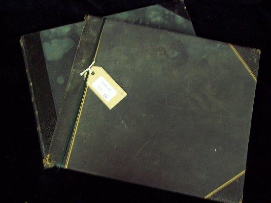 Appraisal: A photograph album including images of family life in the