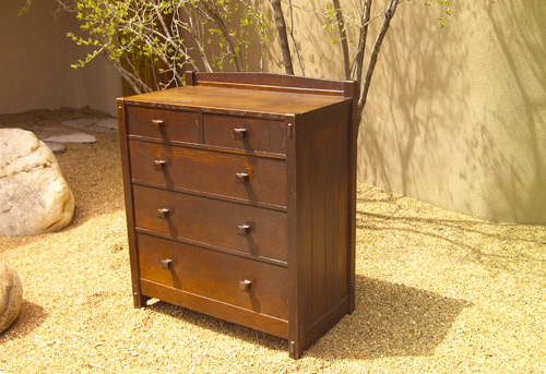 Appraisal: GUSTAV STICKLEY Early chest of drawers in two-over-three configuration with