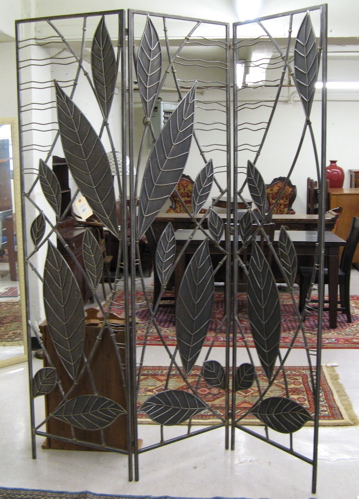 Appraisal: A THREE-PANEL IRON-ART FLOOR SCREEN each panel of black iron