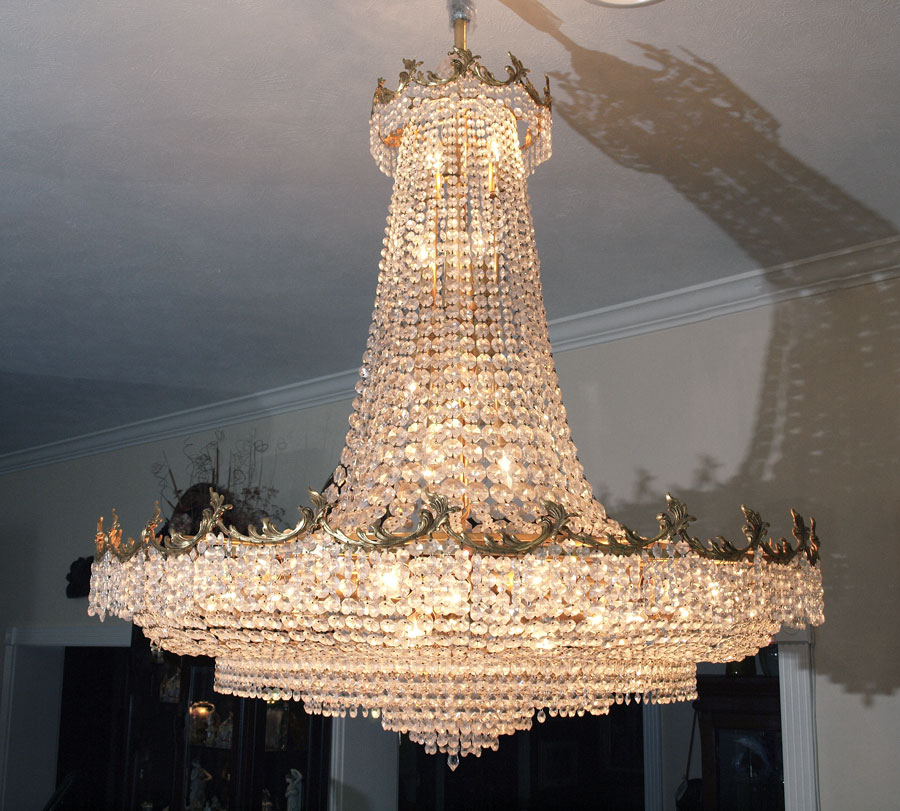 Appraisal: PALATIAL CRYSTAL CHANDELIER lights with multiple levels of crystal swags