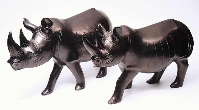 Appraisal: TWO BLACK SOAPSTONE RHINOCEROSES both approximately cm in length