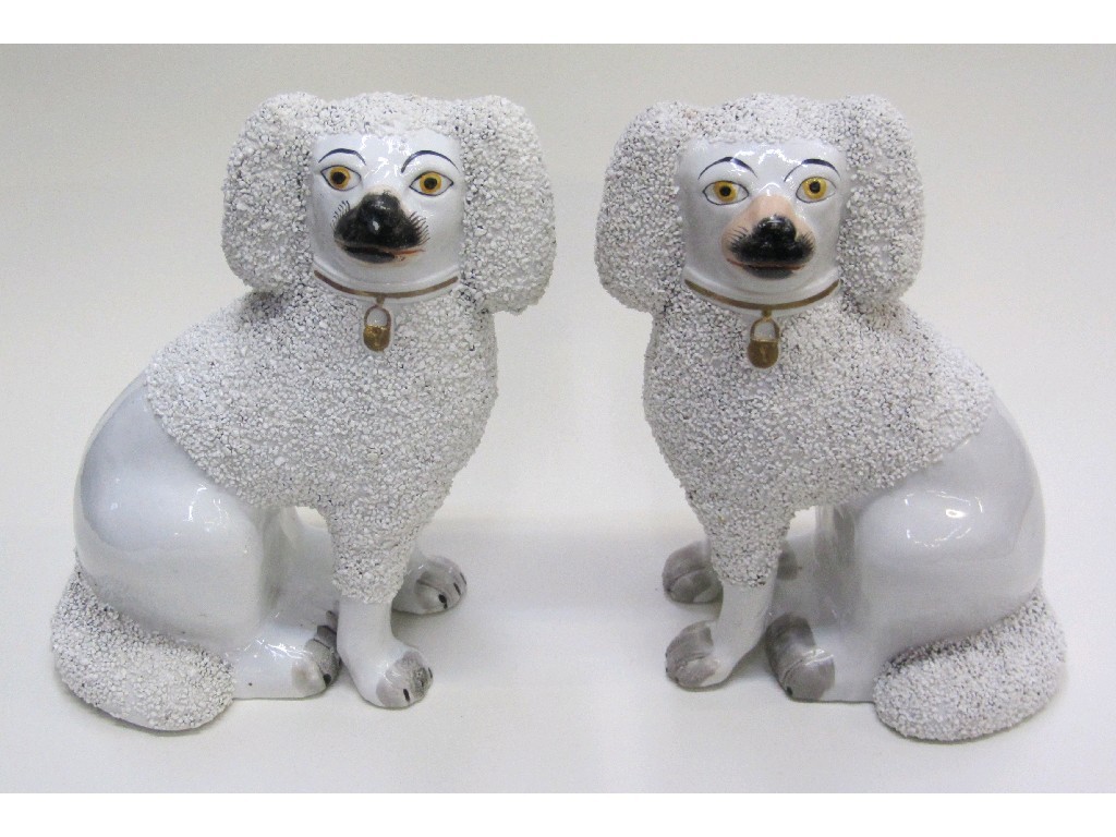 Appraisal: Pair of Staffordshire dog figures each with partial shredded clay