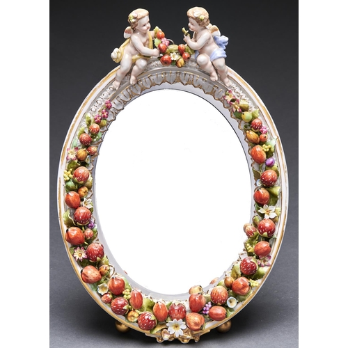 Appraisal: A German porcelain dressing mirror late th c the oval