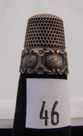 Appraisal: Simons sterling thimble with oval designs on band