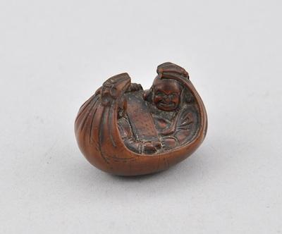 Appraisal: Old Wood Netsuke of Hotei Karako Carved wood netsuke of