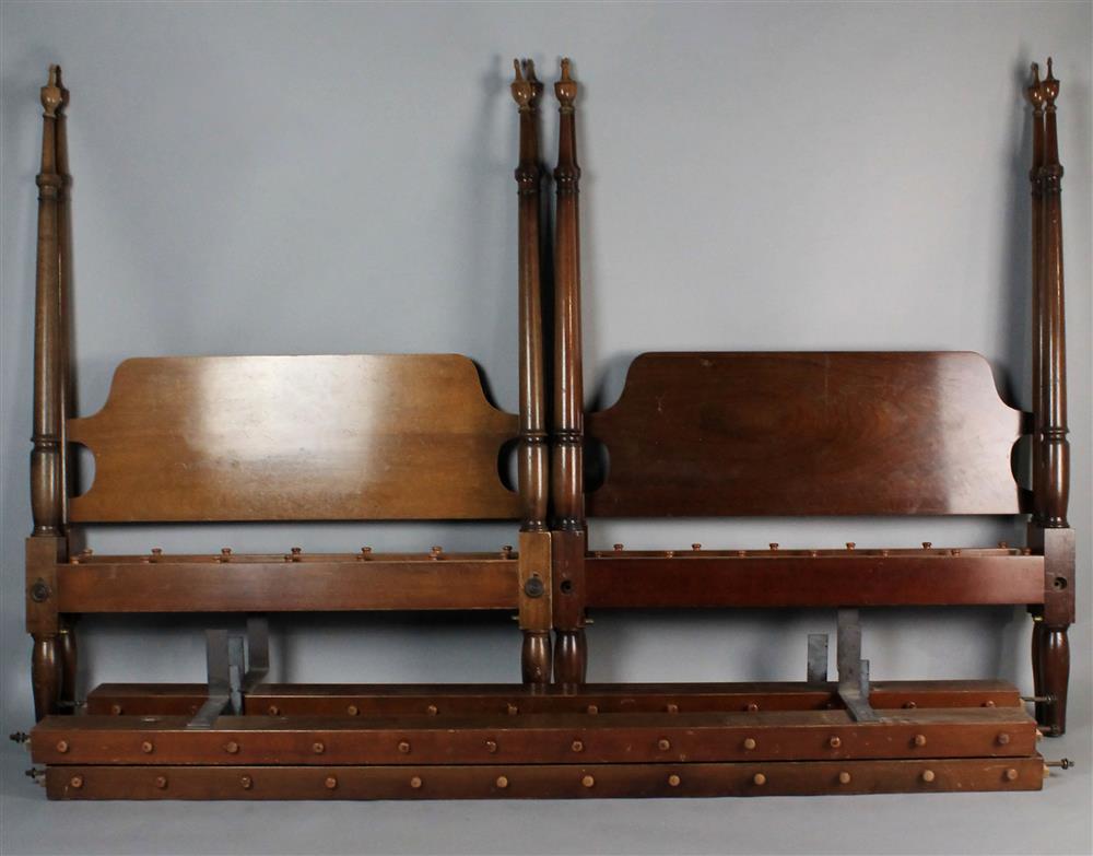 Appraisal: PAIR OF TWIN PENCIL POST MAHOGANY BEDS having four turned