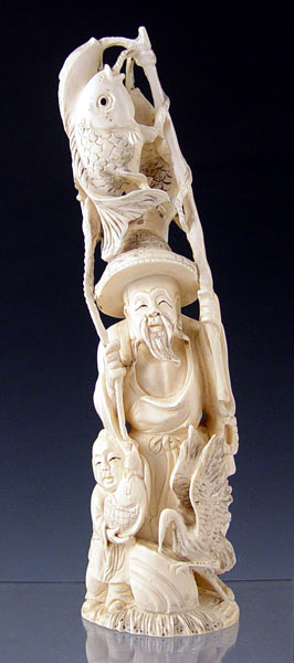 Appraisal: CHINESE CARVED IVORY FISHERMAN WITH HERON CHILD Signed on the