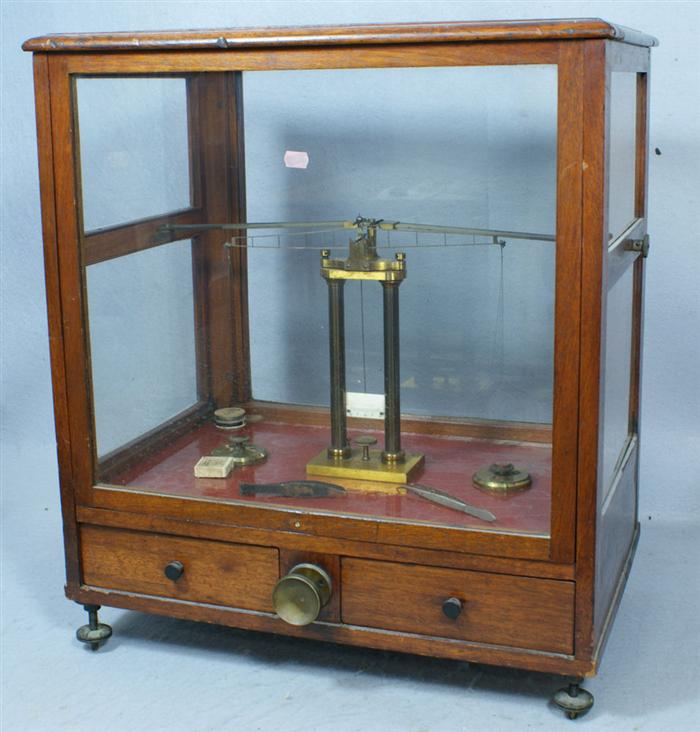 Appraisal: Mahogany cased laboratory scale by L Wertling London one side