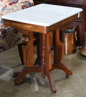 Appraisal: American Victorian Eastlake walnut occasional table having a carerra marble