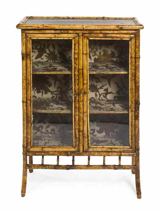 Appraisal: A Victorian Lacquered Bamboo Cabinet having a rectangular top over