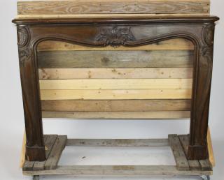 Appraisal: Louis XV style mantel in walnut Louis XV style mantel