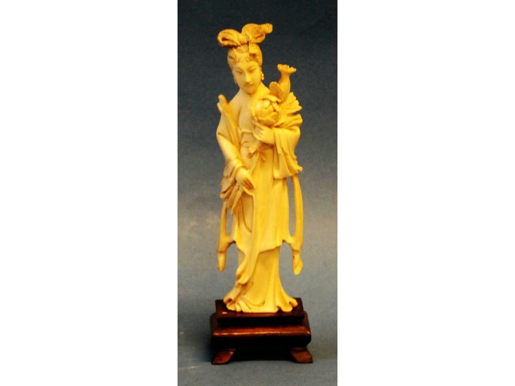 Appraisal: JAPANESE MEIJI PERIOD CARVED IVORY FIGURE OF GUAN-YIN modelled standing