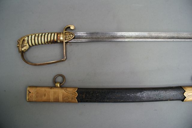 Appraisal: A British Naval Officer's small sword inch single edged blade