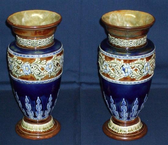 Appraisal: Pair of Royal Doulton stoneware vases with applied floral decoration