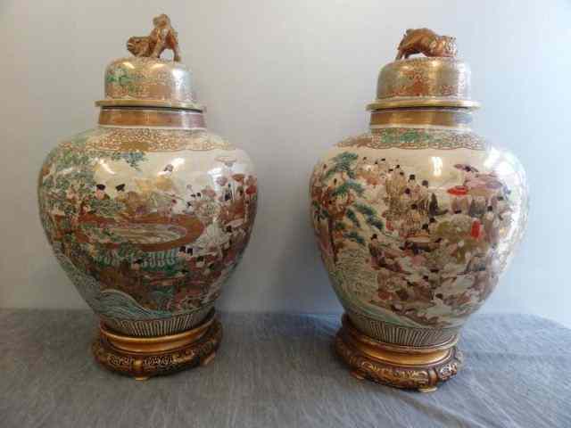 Appraisal: Magnificent Pair of Satsuma Lidded Porcelain Urns Comes with original