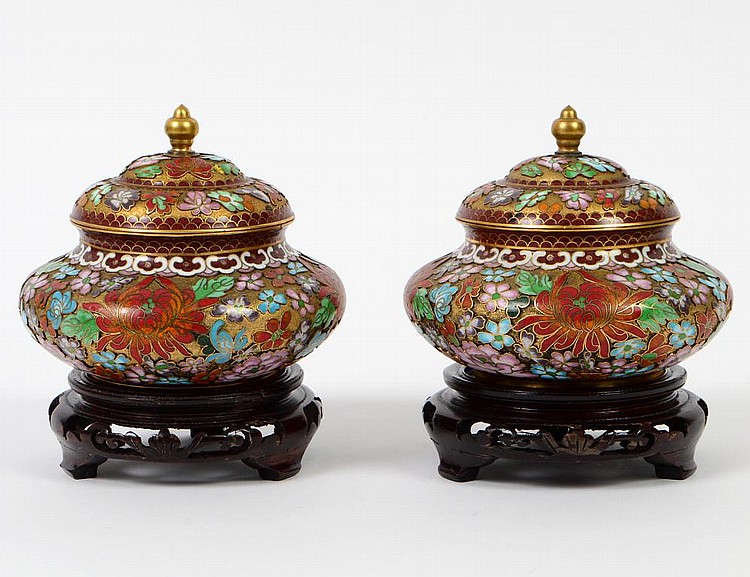 Appraisal: PAIR OF CHINESE GILT GROUND CLOISIONNIE COVERED JARSThe flattened spherical