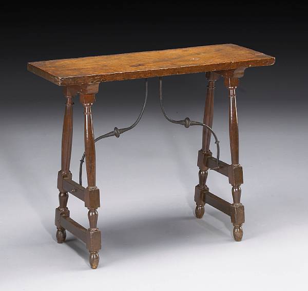 Appraisal: A Spanish Baroque iron mounted walnut table late th century