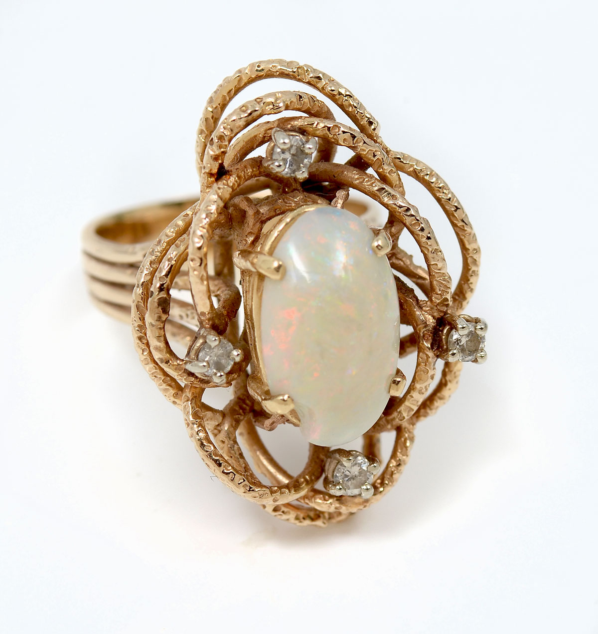 Appraisal: K CABOCHON OPAL RING K yellow gold ring contains round