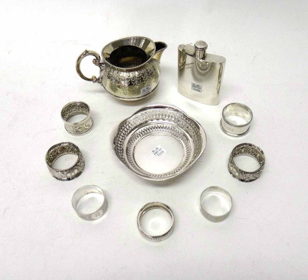 Appraisal: A pair of silver napkin rings with engine turned decoration