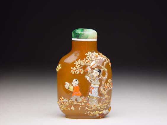 Appraisal: EMBELLISHED AGATE SNUFF BOTTLE Small and finely hollowed carved agate