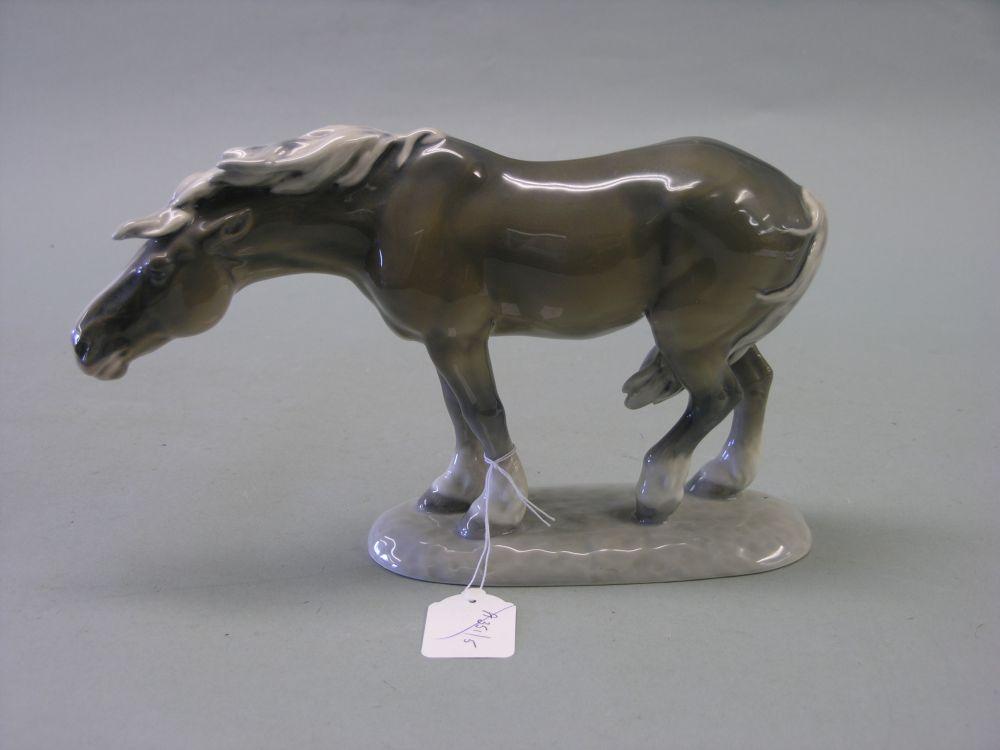 Appraisal: A Royal Copenhagen figure of a horse in long SEE