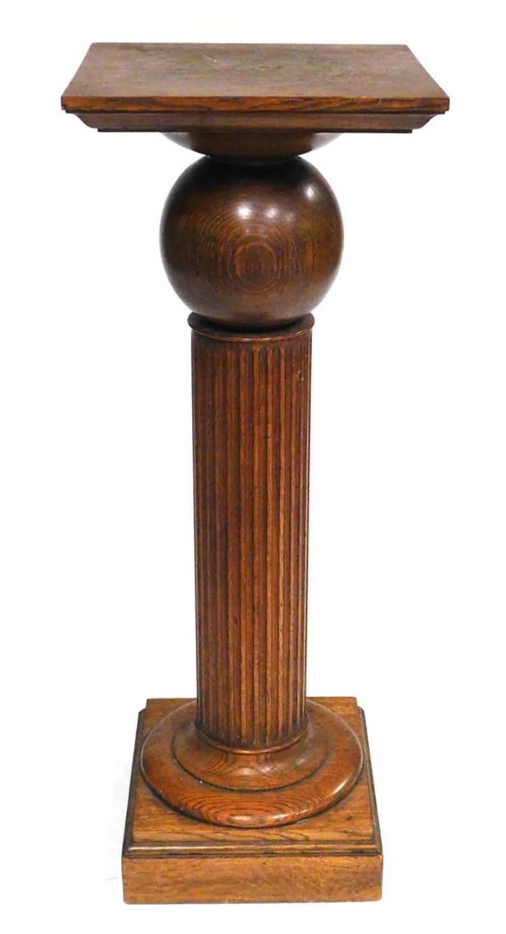 Appraisal: Display pedestal oak sphere over fluted column wear consistent with