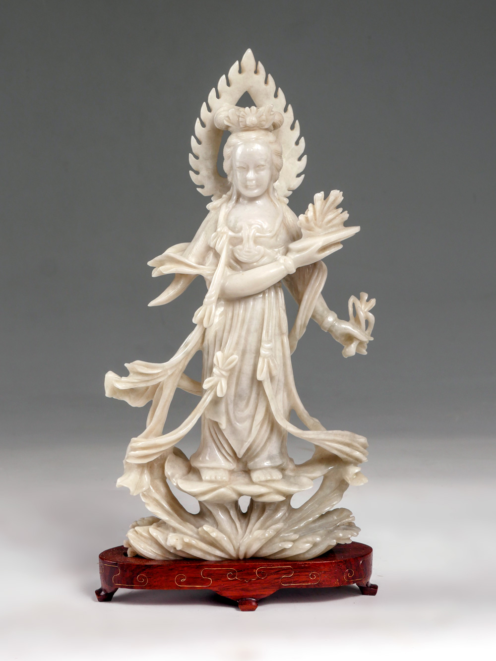 Appraisal: CARVED CHINESE WHITE JADE QUAN-YIN Finely carved Quan-Yin standing on