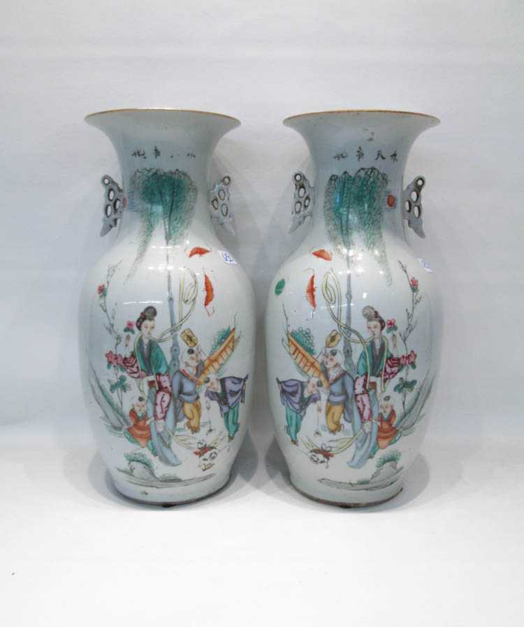 Appraisal: PAIR OF CHINESE PORCELAIN VASES with hand painted genre scenes