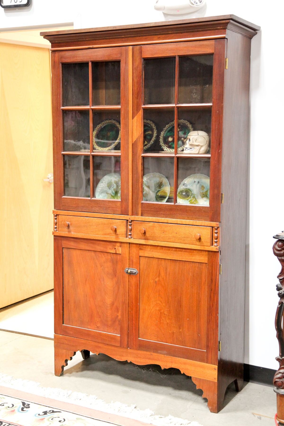 Appraisal: ONE PIECE WALL CUPBOARD American late th century Mixed woods