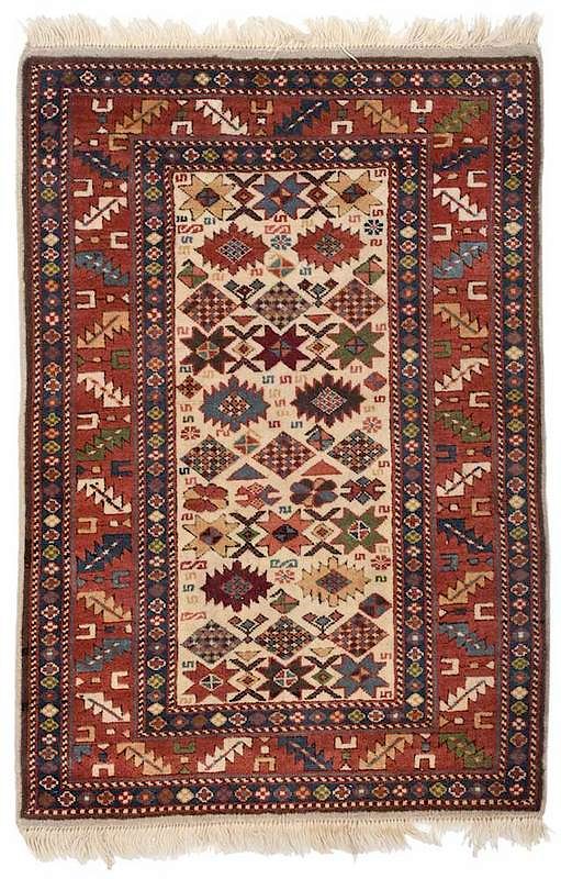 Appraisal: Turkish Rug ivory field with rows of geometric stars and