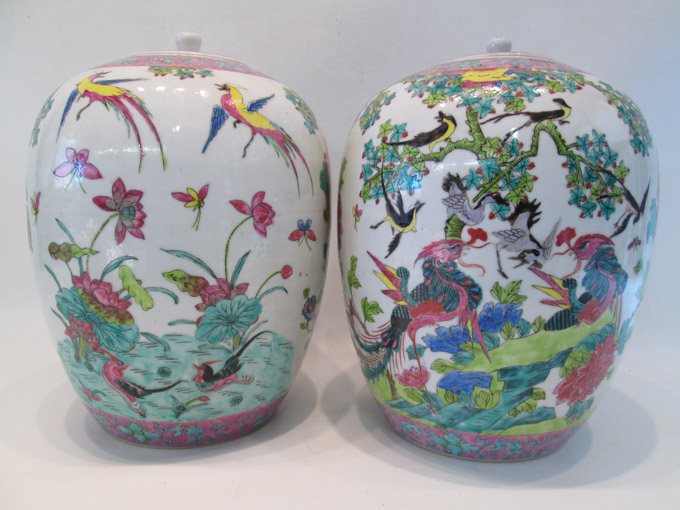 Appraisal: PAIR OF CHINESE PORCELAIN ENAMEL JARS featuring phoenix and fowl