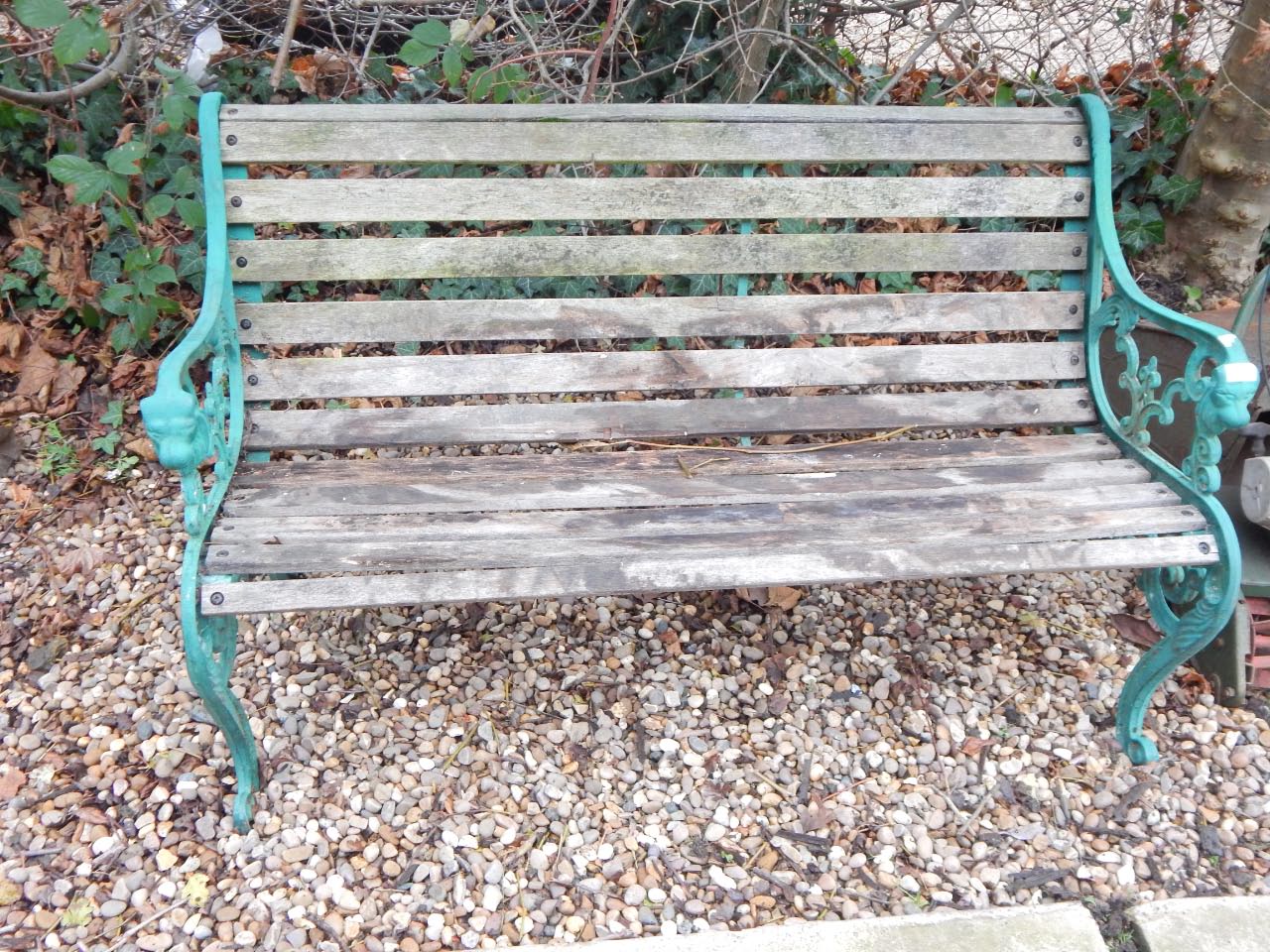 Appraisal: A reproduction painted metal garden bench with hound dog cast