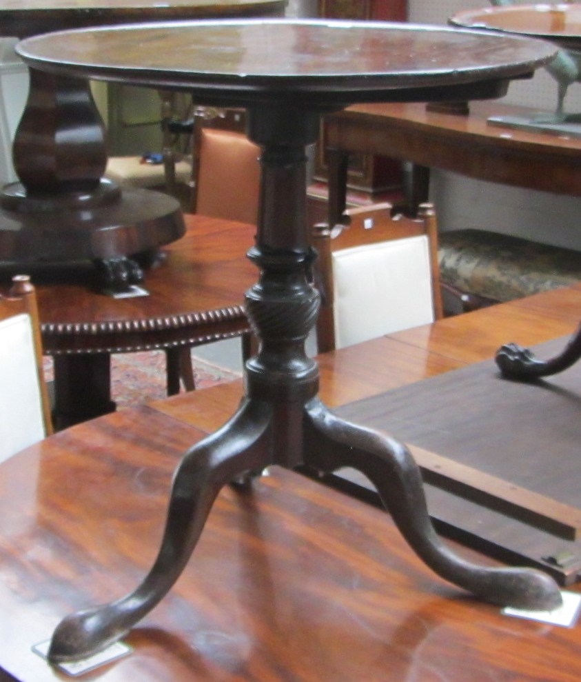 Appraisal: A mid th century mahogany occasional table the dished circular