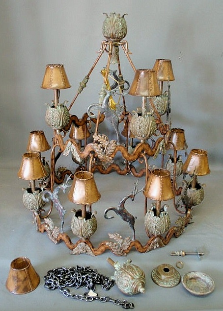 Appraisal: Contemporary cast brass verdigris chandelier with three tiers hide shades