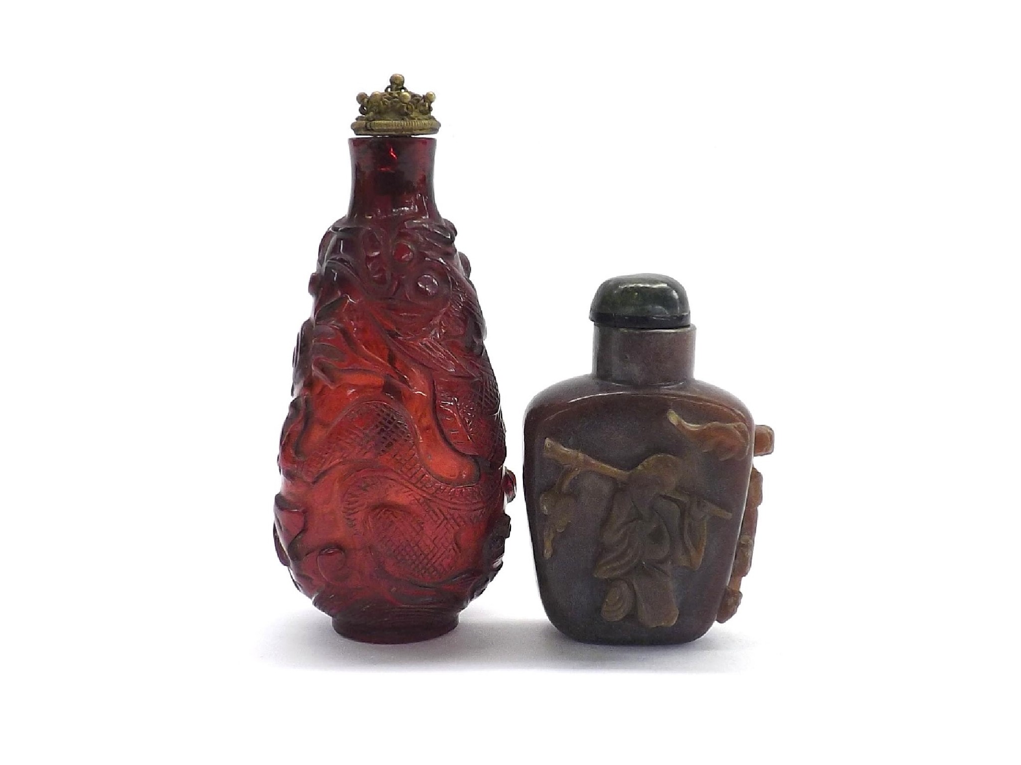 Appraisal: Ruby glass pear shaped snuff bottle carved with a dragon