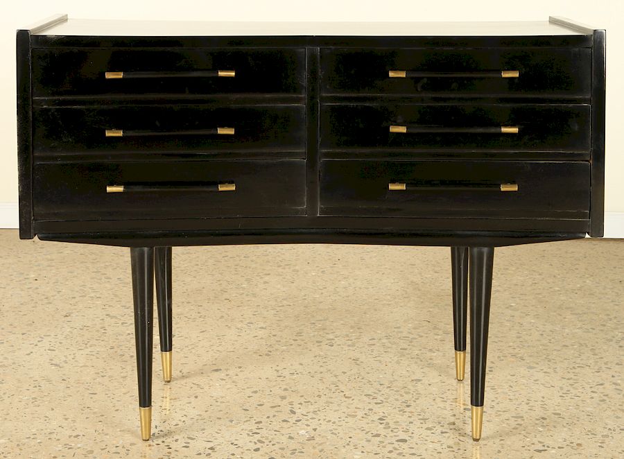 Appraisal: EBONIZED DRESSER MANNER OF ROBSJOHN GIBBINGS A six drawer ebonized