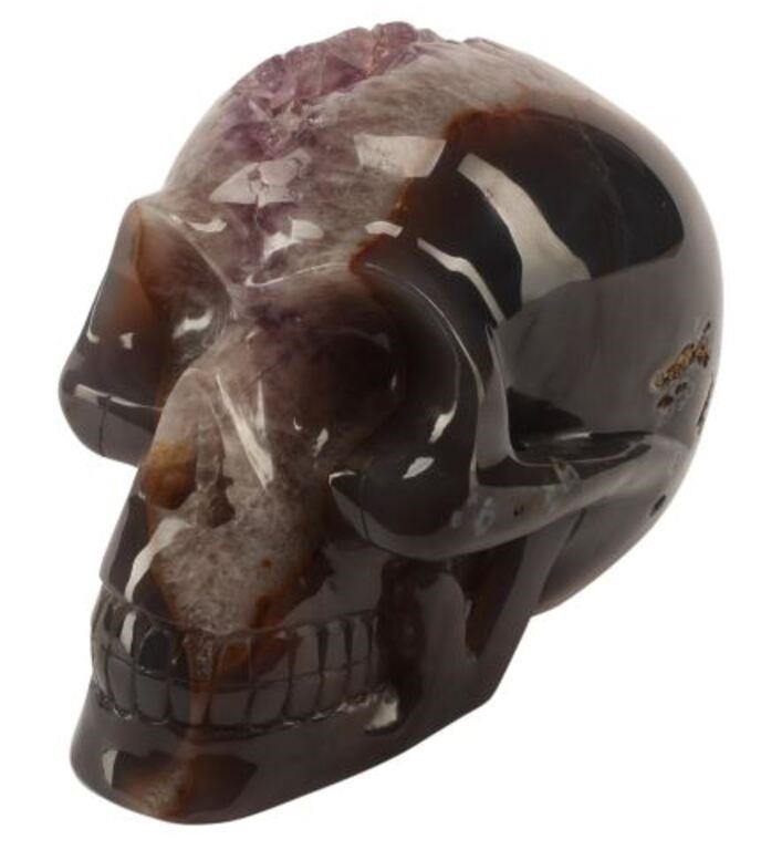 Appraisal: Carved specimen of agate and amethyst skull approx h w