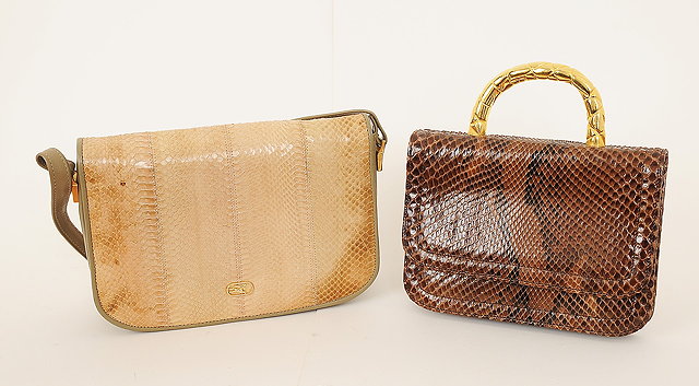 Appraisal: A small vintage Givenchy snakeskin bag gilt metal loop handle