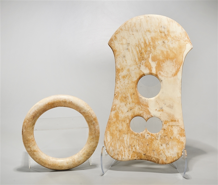 Appraisal: Two Chinese stone ornaments including one ring and one axe