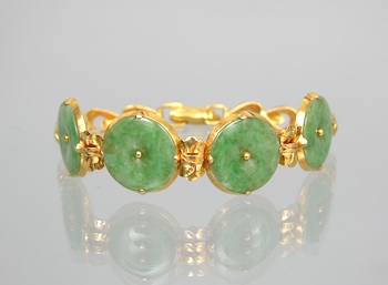 Appraisal: A Ladies' Jade Discs Bracelet in Gold k yellow gold