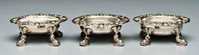 Appraisal: Three English silver master salts each oval with four dolphin